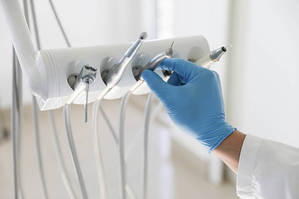 Professional Tooth Extraction technician working in Carrollton, IL